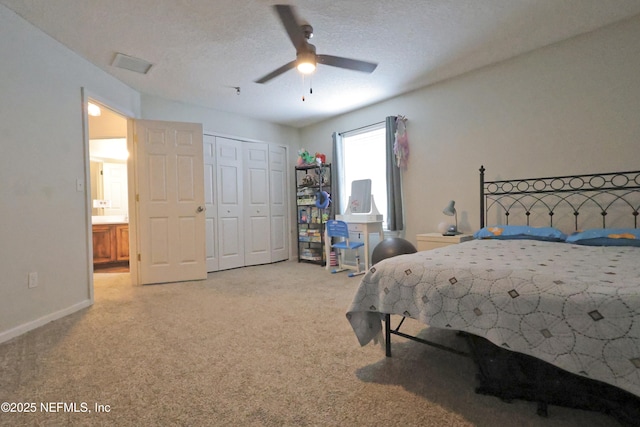 3038 Majestic Oaks Ln, Green Cove Springs, FL 32043 - bedroom featuring carpet, a textured ceiling, a closet, visible vents, and baseboards