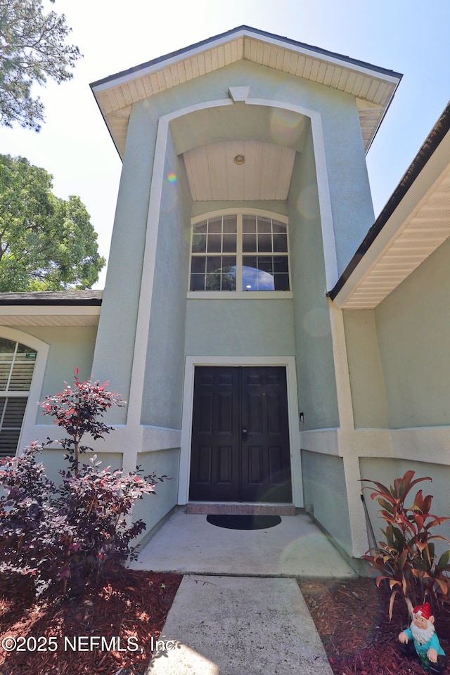 3038 Majestic Oaks Ln, Green Cove Springs, FL 32043 - entrance to property featuring stucco siding