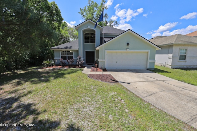 3038 Majestic Oaks Ln, Green Cove Springs, FL 32043 - view of front of home featuring a front yard, an attached garage, stucco siding, and concrete driveway