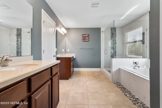 11725 Paddock Gates Dr, Jacksonville, FL 32223 - bathroom with a shower stall, two vanities, a garden tub, tile patterned flooring, and baseboards