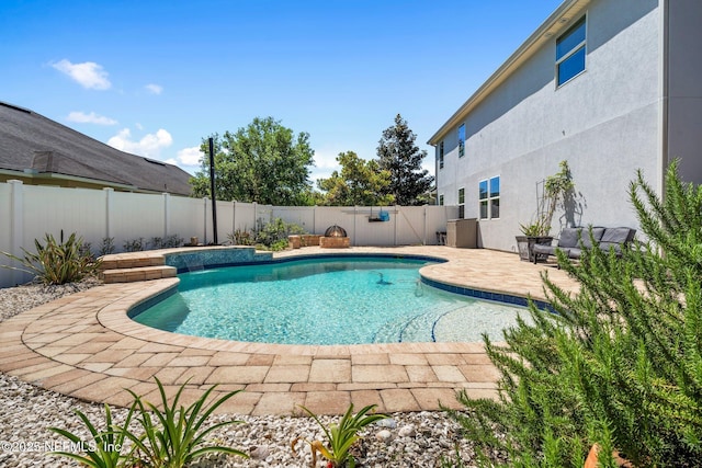 11725 Paddock Gates Dr, Jacksonville, FL 32223 - view of swimming pool with a fenced backyard and a patio area
