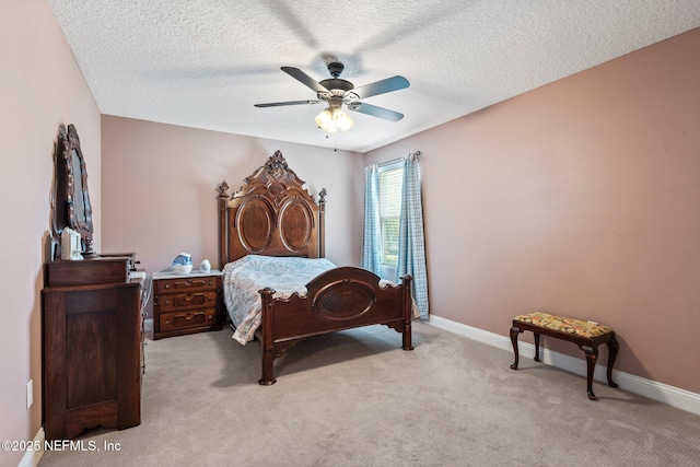 11725 Paddock Gates Dr, Jacksonville, FL 32223 - bedroom featuring light colored carpet, baseboards, a ceiling fan, and a textured ceiling