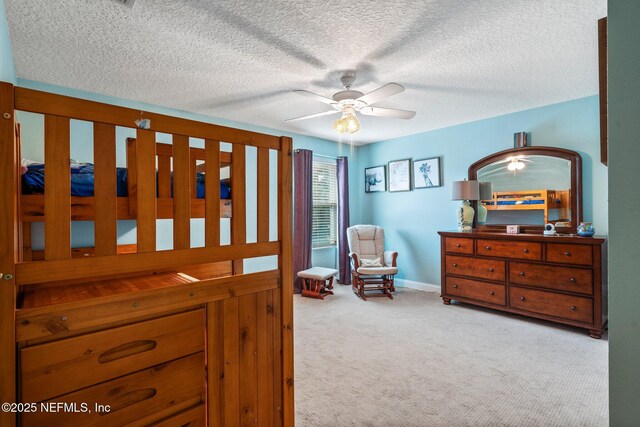 11725 Paddock Gates Dr, Jacksonville, FL 32223 - bedroom with carpet, a textured ceiling, and baseboards