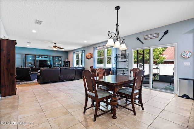 11725 Paddock Gates Dr, Jacksonville, FL 32223 - dining space with light tile patterned floors, plenty of natural light, ceiling fan, recessed lighting, and a textured ceiling