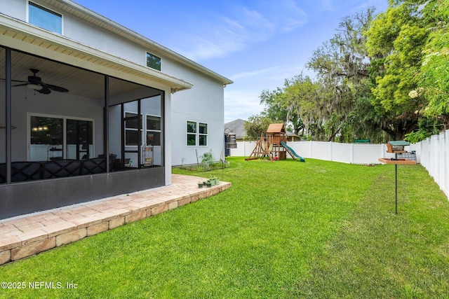 11725 Paddock Gates Dr, Jacksonville, FL 32223 - view of yard featuring a playground, a sunroom, and ceiling fan
