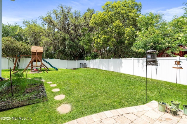 11725 Paddock Gates Dr, Jacksonville, FL 32223 - view of yard featuring a playground and view of scattered trees