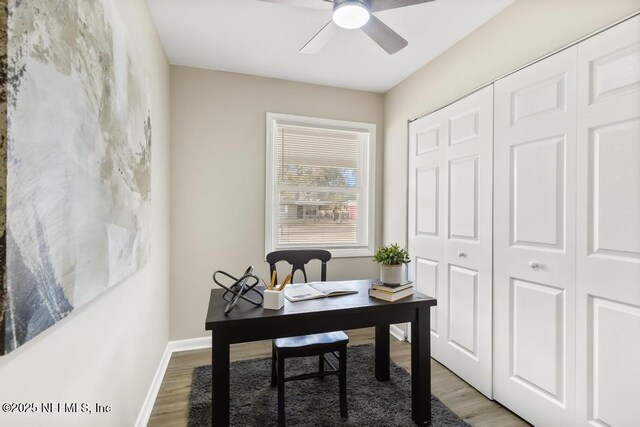 10625 Dodd Rd, Jacksonville, FL 32218 - office featuring ceiling fan, light wood-style floors, and baseboards
