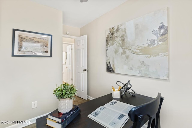 10625 Dodd Rd, Jacksonville, FL 32218 - home office with baseboards and wood finished floors