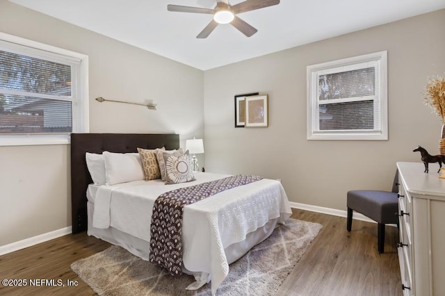 10625 Dodd Rd, Jacksonville, FL 32218 - bedroom featuring baseboards, a ceiling fan, and wood finished floors