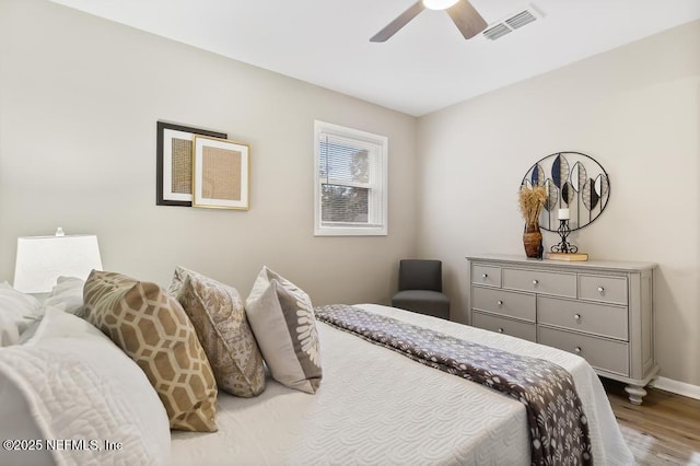 10625 Dodd Rd, Jacksonville, FL 32218 - bedroom featuring wood finished floors, ceiling fan, baseboards, and visible vents