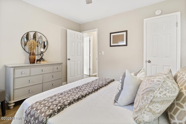 10625 Dodd Rd, Jacksonville, FL 32218 - bedroom with wood finished floors and ceiling fan