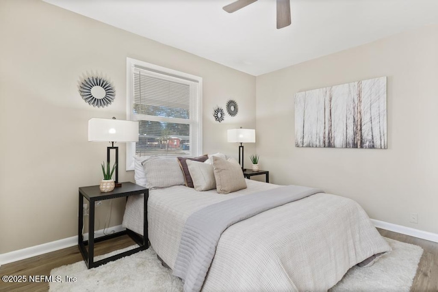 10625 Dodd Rd, Jacksonville, FL 32218 - bedroom featuring wood finished floors, baseboards, and a ceiling fan