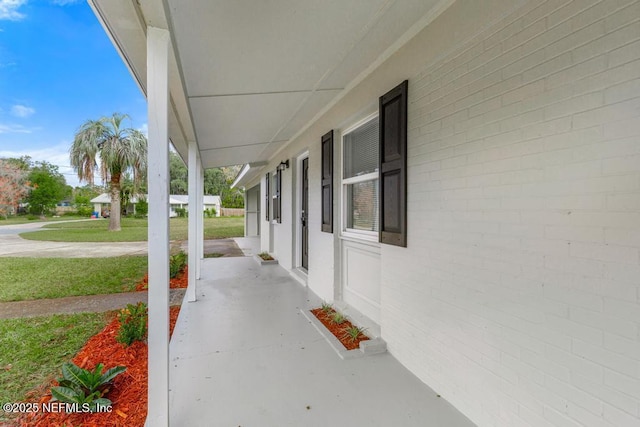 10625 Dodd Rd, Jacksonville, FL 32218 - view of patio featuring covered porch