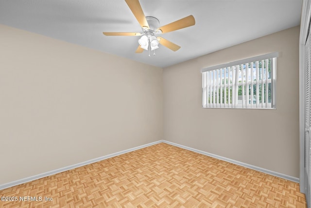 706 Montego Rd E, Jacksonville, FL 32216 - spare room with baseboards and ceiling fan