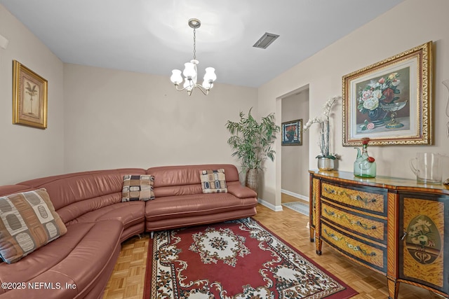 706 Montego Rd E, Jacksonville, FL 32216 - living room featuring visible vents, baseboards, and an inviting chandelier