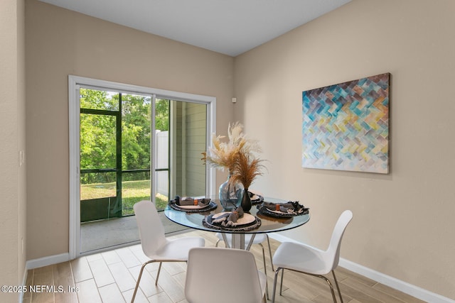2627 Sandy Dune Dr, Jacksonville, FL 32233 - dining space with baseboards and wood finished floors