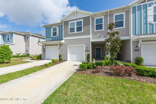 2627 Sandy Dune Dr, Jacksonville, FL 32233 - multi unit property featuring an attached garage and driveway