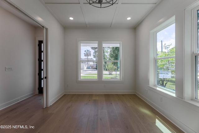 unfurnished room with light wood-style flooring, recessed lighting, and baseboards