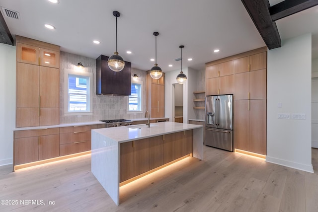 kitchen featuring stainless steel appliances, recessed lighting, visible vents, and modern cabinets