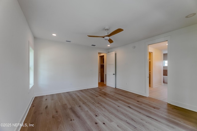 unfurnished room with recessed lighting, light wood finished floors, visible vents, and ceiling fan