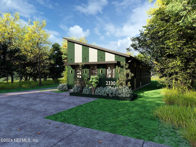 2330 Janette St, Jacksonville, FL 32209 - view of front of home with a front lawn