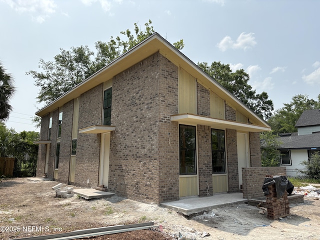2330 Janette St, Jacksonville, FL 32209 - rear view of property featuring brick siding
