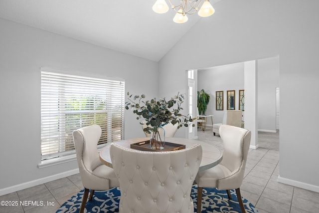 dining room with high vaulted ceiling, baseboards, an inviting chandelier, and light tile patterned floors