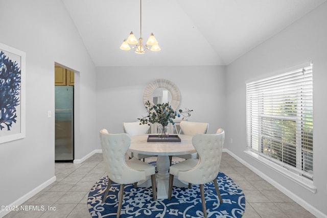 dining space with vaulted ceiling, baseboards, a notable chandelier, and light tile patterned floors