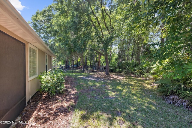 view of yard with fence