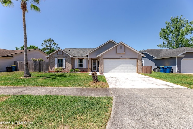 single story home with driveway, an attached garage, fence, a front yard, and brick siding