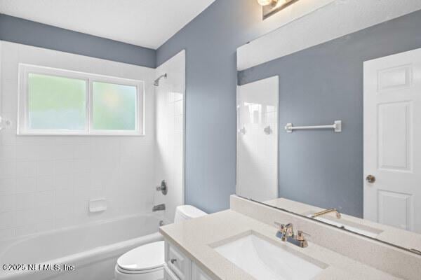 11978 Canterwood Dr, Jacksonville, FL 32246 - bathroom featuring vanity, shower / tub combination, and toilet