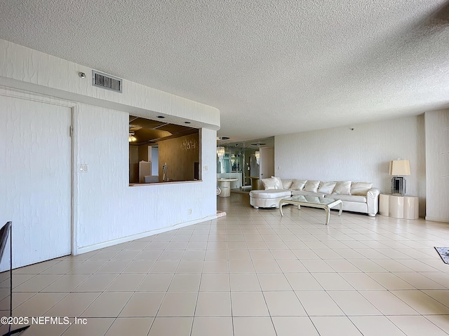 20225 NE 34th Ct Unit 817, Miami, FL 33810 - living room with visible vents and a textured ceiling