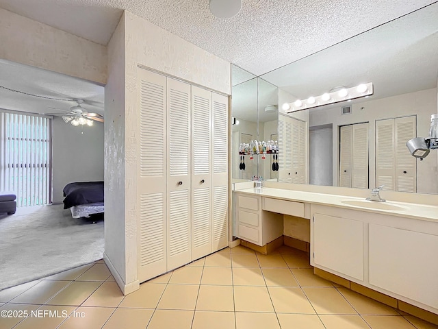 20225 NE 34th Ct Unit 817, Miami, FL 33810 - full bath featuring a textured ceiling, a closet, and tile patterned flooring