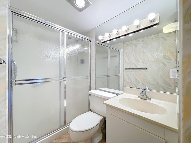20225 NE 34th Ct Unit 817, Miami, FL 33810 - bathroom featuring toilet, a stall shower, and vanity