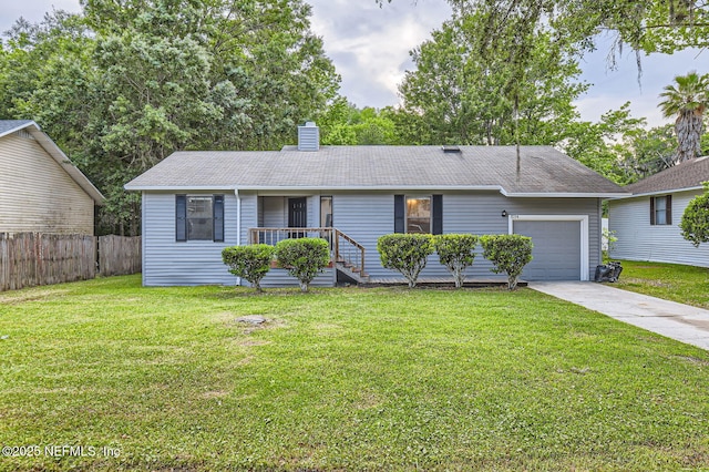 ranch-style home with a chimney, fence, a front lawn, concrete driveway, and an attached garage