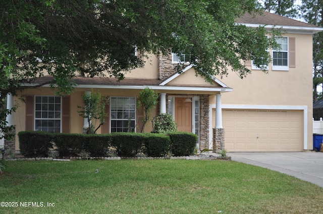view of front of property with a garage, a front lawn, stone siding, stucco siding, and concrete driveway