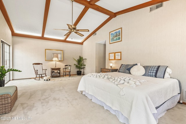 carpeted bedroom featuring lofted ceiling with beams and visible vents