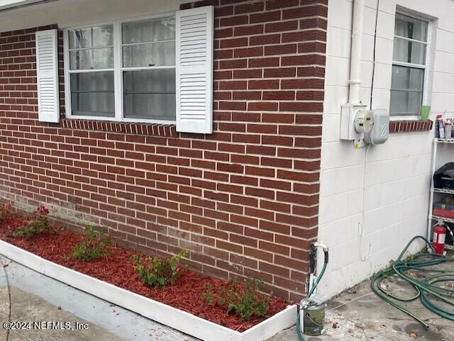 4123 Piper Dr, Jacksonville, FL 32207 - view of home's exterior featuring brick siding