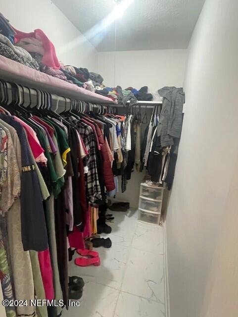 4123 Piper Dr, Jacksonville, FL 32207 - spacious closet featuring marble finish floor