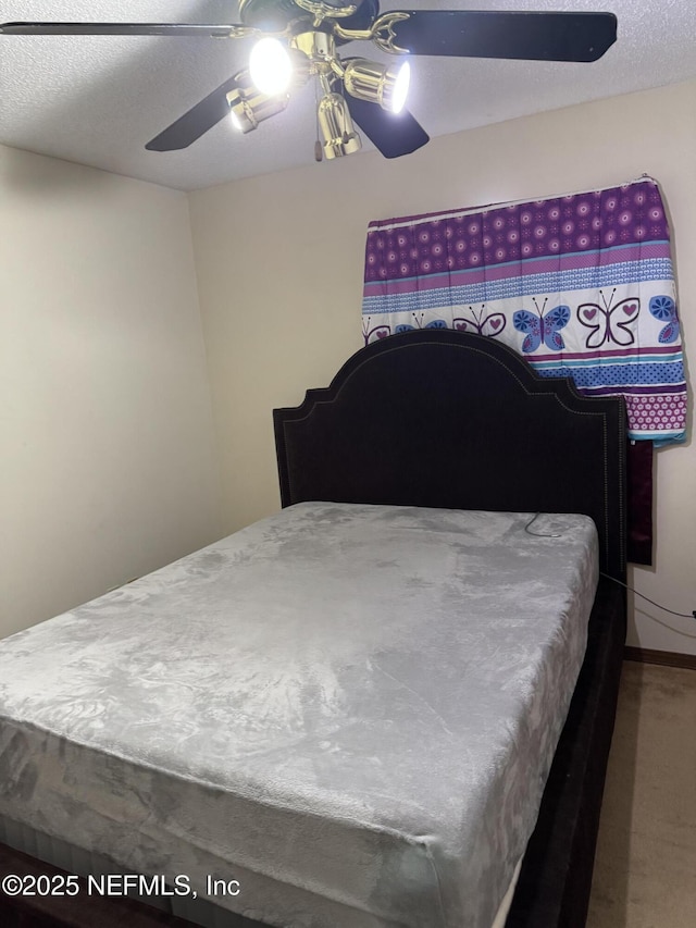 1717 Derringer Rd, Jacksonville, FL 32225 - bedroom featuring a ceiling fan and carpet flooring