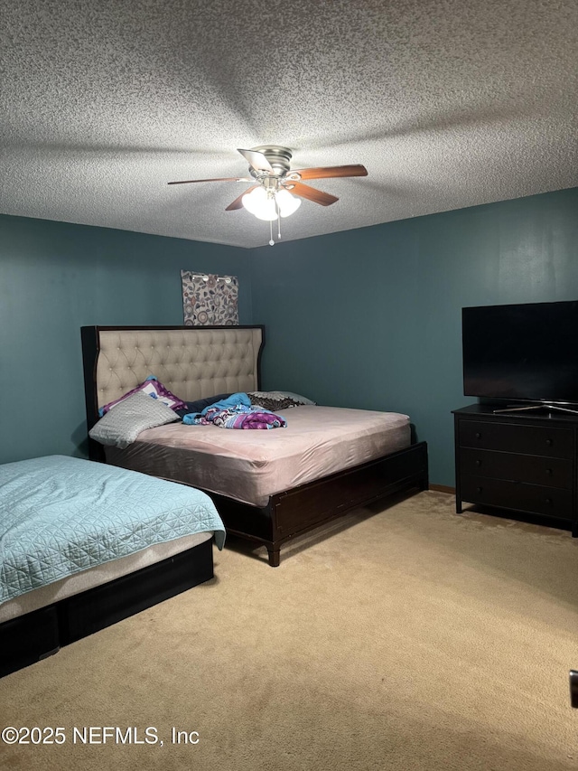 1717 Derringer Rd, Jacksonville, FL 32225 - carpeted bedroom with a textured ceiling and ceiling fan