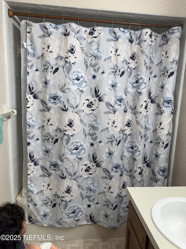 1717 Derringer Rd, Jacksonville, FL 32225 - full bath with wallpapered walls, a shower with shower curtain, and vanity
