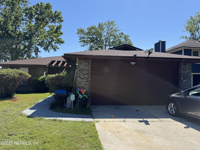 1717 Derringer Rd, Jacksonville, FL 32225 - view of property exterior featuring a yard, brick siding, a garage, roof with shingles, and concrete driveway
