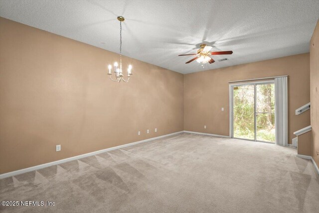 7831 Melvin Rd Unit 1, Jacksonville, FL 32210 - carpeted empty room featuring visible vents, ceiling fan with notable chandelier, and baseboards