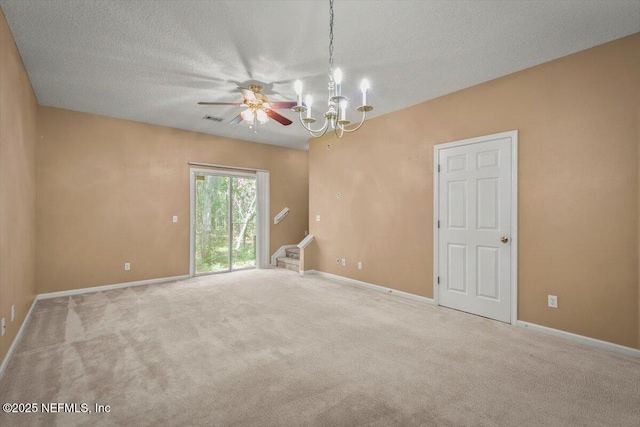 7831 Melvin Rd Unit 1, Jacksonville, FL 32210 - carpeted spare room with visible vents, baseboards, ceiling fan with notable chandelier, and a textured ceiling