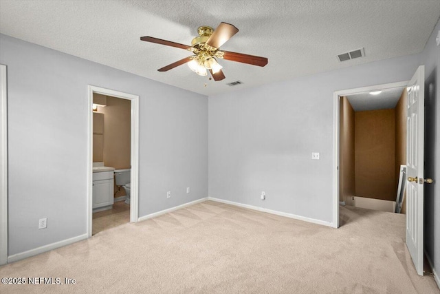 7831 Melvin Rd Unit 1, Jacksonville, FL 32210 - unfurnished bedroom with visible vents, baseboards, and light carpet