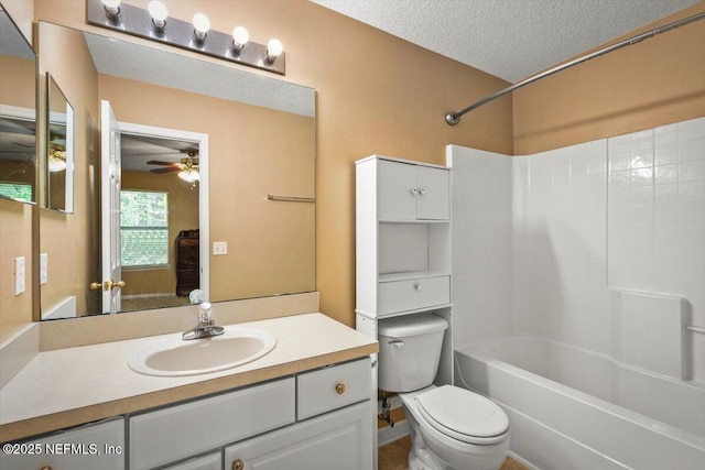 7831 Melvin Rd Unit 1, Jacksonville, FL 32210 - full bathroom with washtub / shower combination, vanity, a textured ceiling, toilet, and ceiling fan