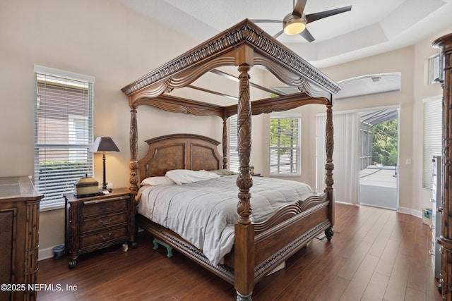 1542 Wescott Loop, Winter Springs, FL 32708 - bedroom featuring dark wood-type flooring, access to exterior, a ceiling fan, and baseboards