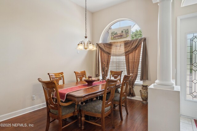 1542 Wescott Loop, Winter Springs, FL 32708 - dining space with wood finished floors, decorative columns, and baseboards
