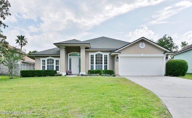 2612 S Waterleaf Dr, Saint Augustine, FL 32092 - view of front facade with an attached garage, stucco siding, driveway, and a shingled roof